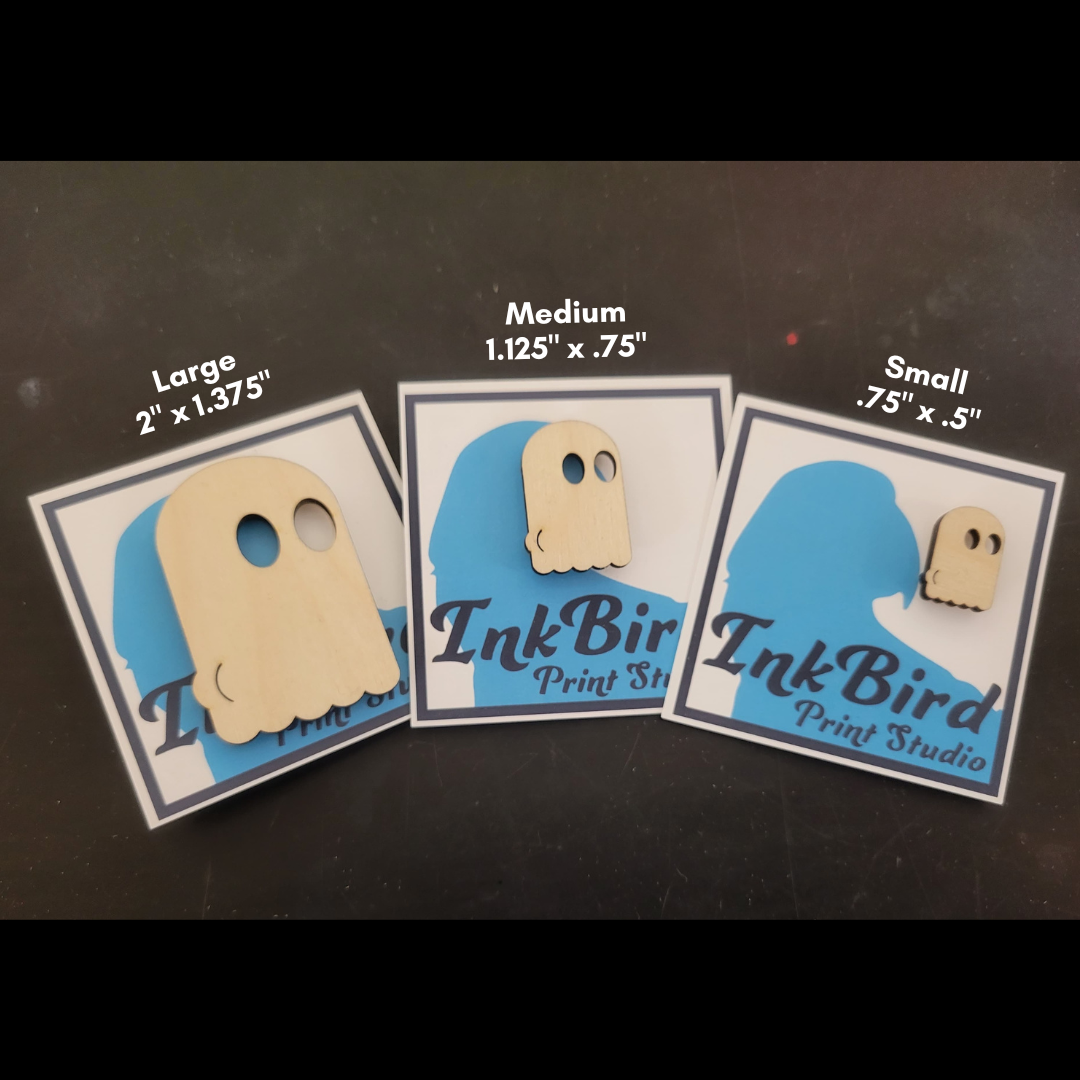 A laser cut wood pin/brooch, in three sizes (small/med/large), of a ghost with the outline of their butt-cheeks visible in their sheet.