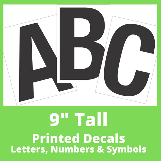 Photo of a set of 9 inch tall rectangular decals with the letters A B C as a sample, showcasing a clean, modern font. The decals are white with printed black letters on them, arranged in a fan-like layout.