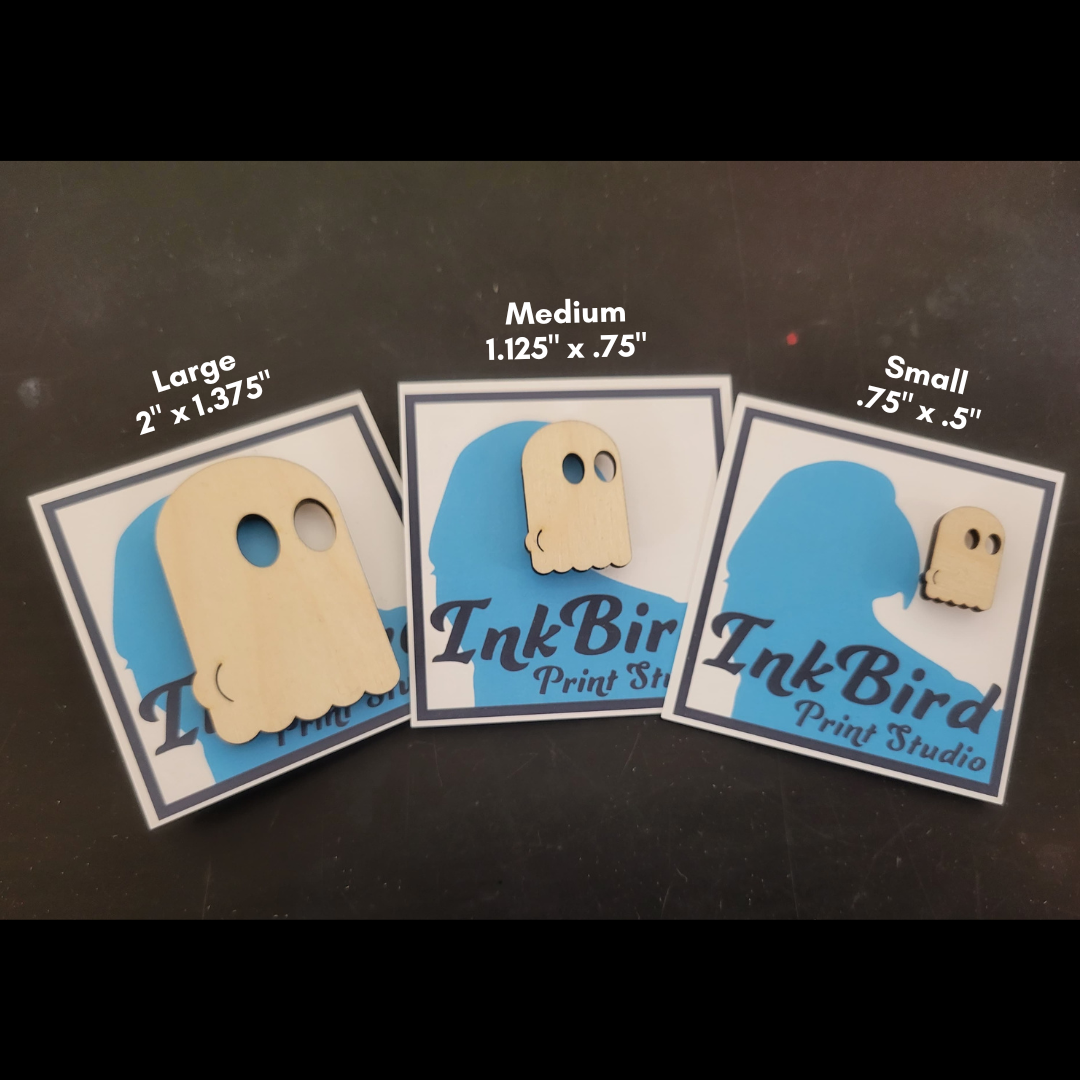 A laser cut wood pin/brooch, in three sizes (small/med/large), of a ghost with the outline of their butt-cheeks visible in their sheet. 