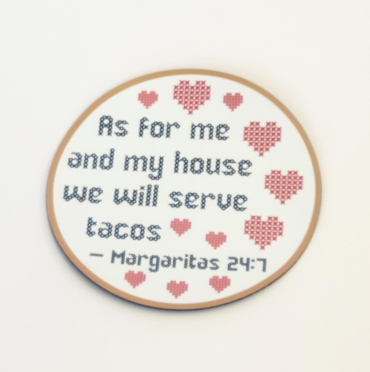 The Cross Stitch Design Fridge Magnet by InkBird Print Studio LLC, featuring the playful text "As for me and my house, we will serve tacos. Margaritas 24:7," is adorned with red hearts on a white background. This charming piece is an ideal housewarming gift that brings both humor and warmth to any home.