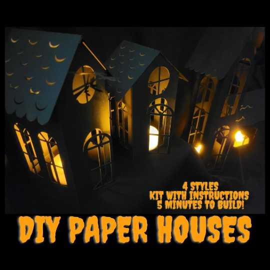 The DIY Spooky House Paper Kit by InkBird Print Studio LLC features charming paper houses with arched windows that glow warmly from within, perfect for creating a cozy Halloween ambiance. The kit includes laser-cut cardstock and instructions to craft four different styles of houses in just five minutes. Ideal for use with an LED tealight!